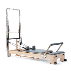 Elina Pilates Lignum wooden reformer with tower in grey, angled view