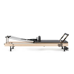 Elina Pilates Vertical Reformer in black, full side view
