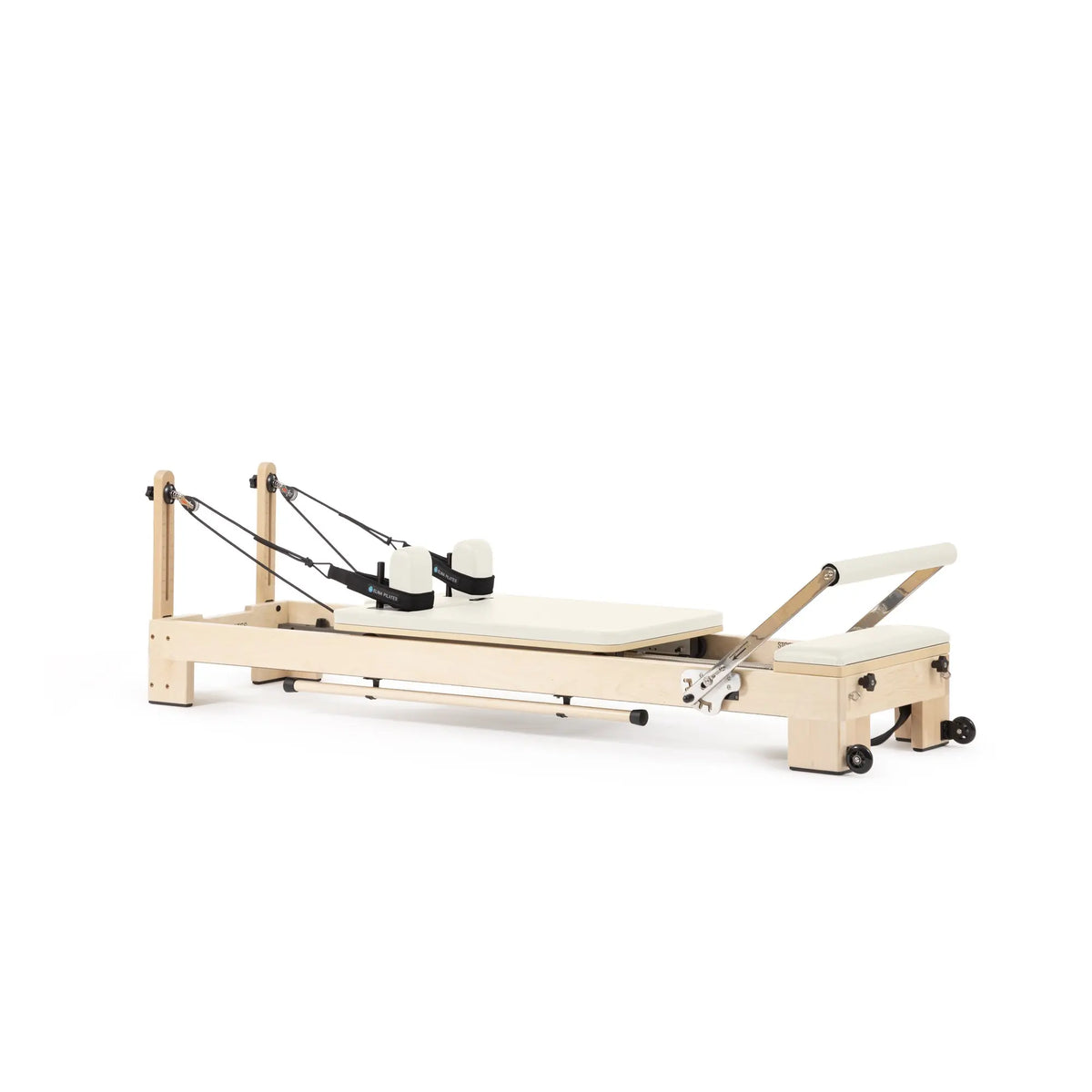 Elina Pilates Lignum wooden reformer in ivory, angled view