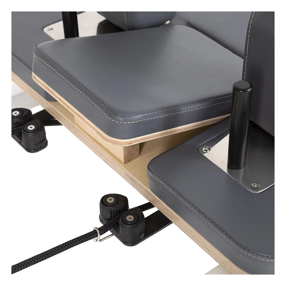 Close-up of the grey upholstery on the Elina Pilates Lignum Reformer with Tower