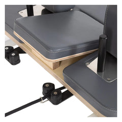Close-up of the grey upholstery on the Elina Pilates Lignum Reformer with Tower