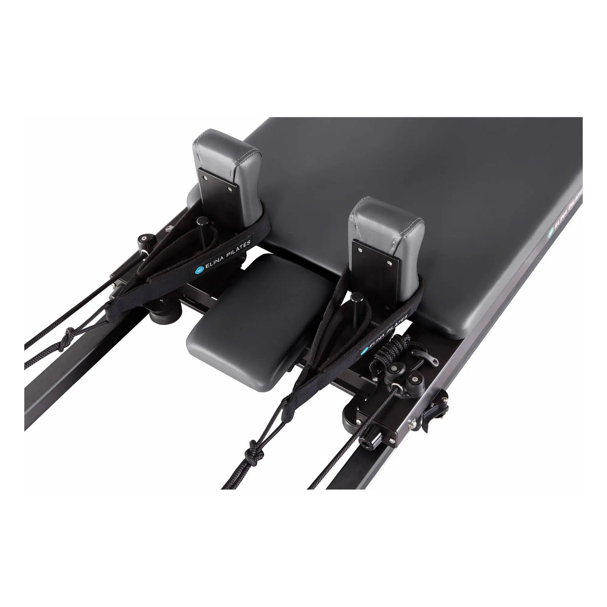 Close-up of the carriage and shoulder rests on the Elina Pilates Domo Reformer