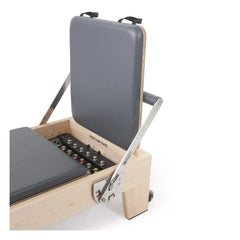 Close-up of the upholstery and adjustment system on the grey Elina Pilates Elite Reformer