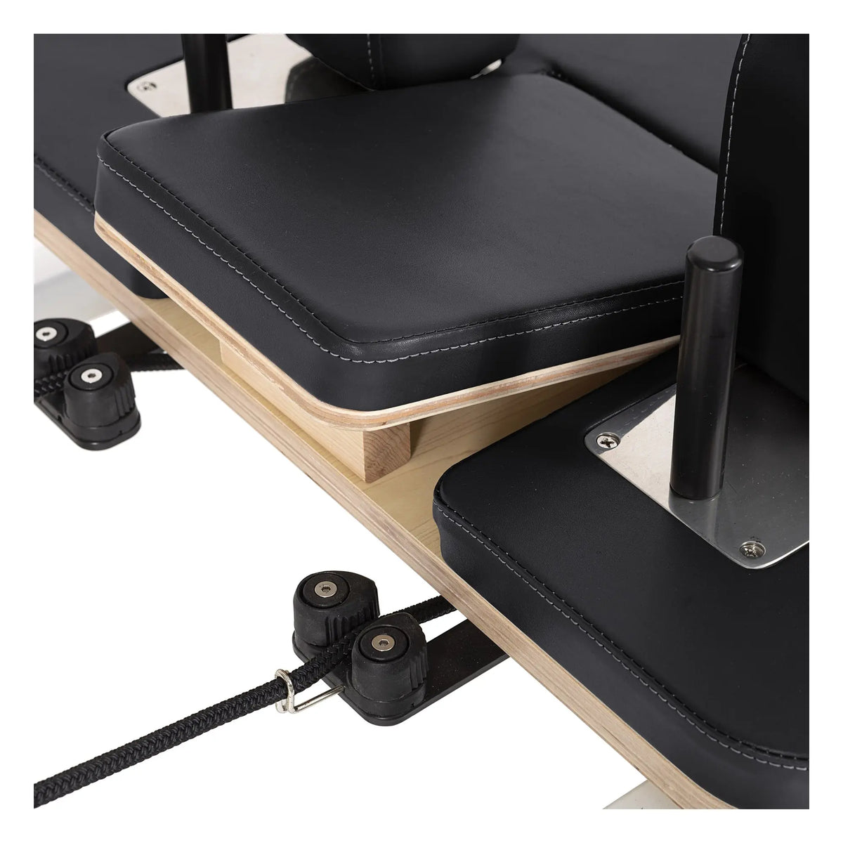 Close-up of the black upholstery on the Elina Pilates Lignum Reformer with Tower