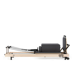 Elina Pilates Vertical Reformer in black with sitting box
