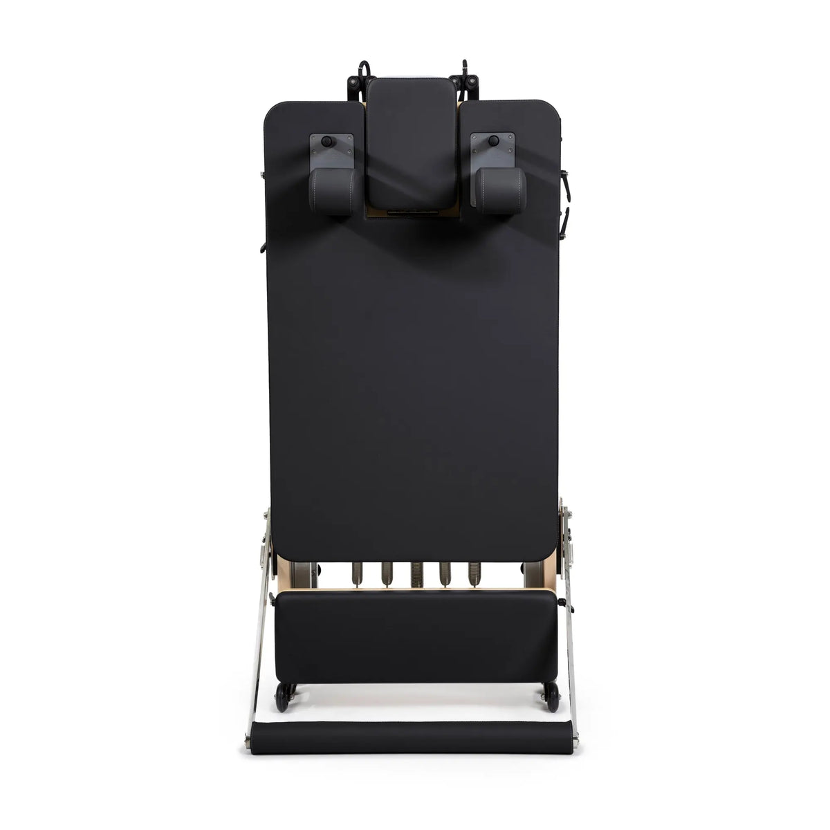 Elina Pilates Fold Reformer standing upright between workouts