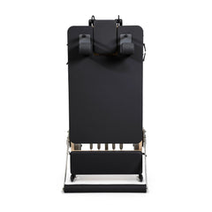 Elina Pilates Fold Reformer standing upright between workouts