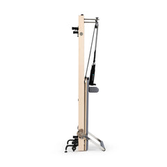 Grey Elina Pilates Vertical Reformer stored upright between workouts