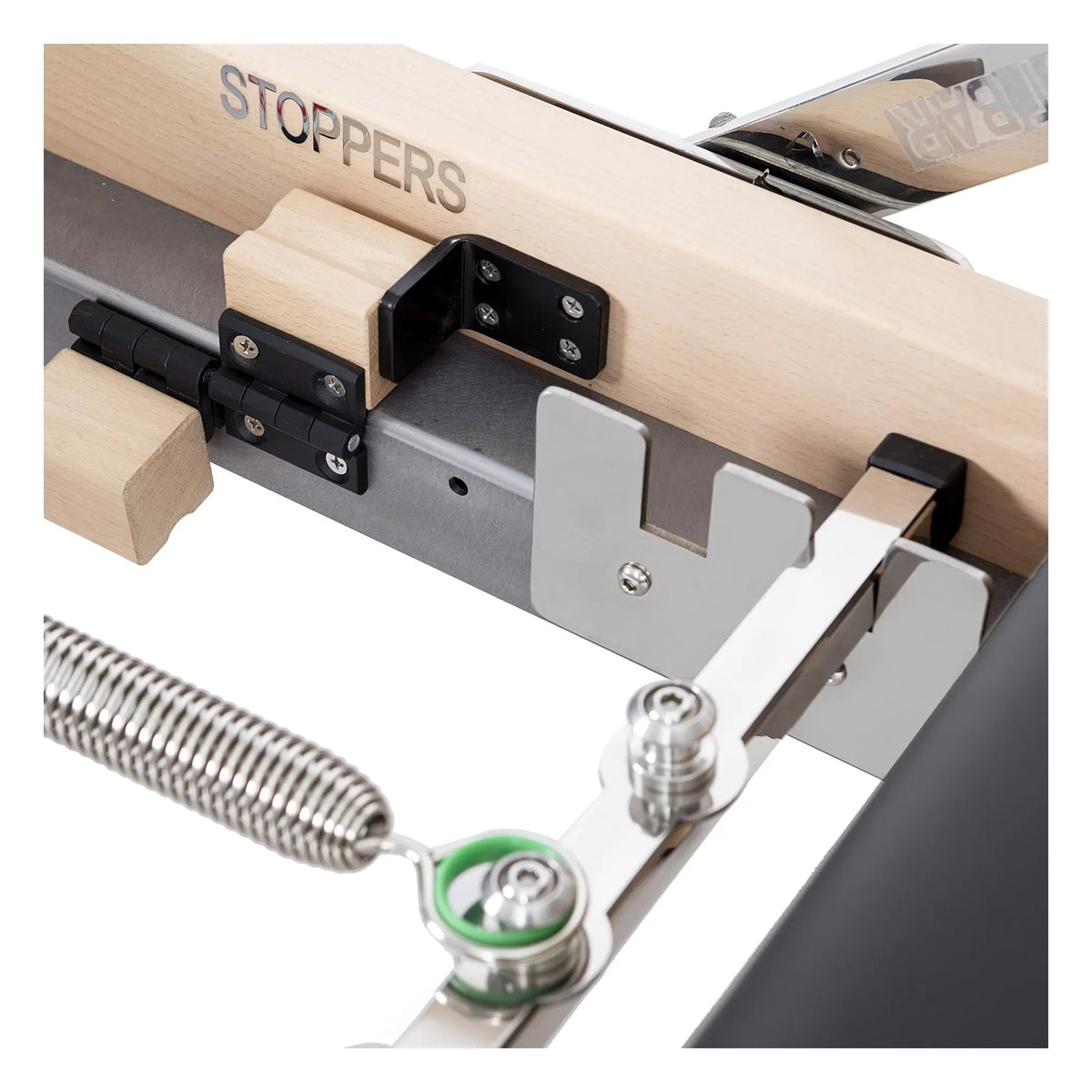 Close-up of the stopper system on the black Elina Pilates Lignum Reformer with Tower