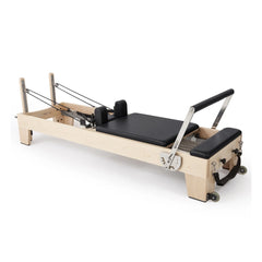 Elina Pilates Elite wooden reformer in black, angled view