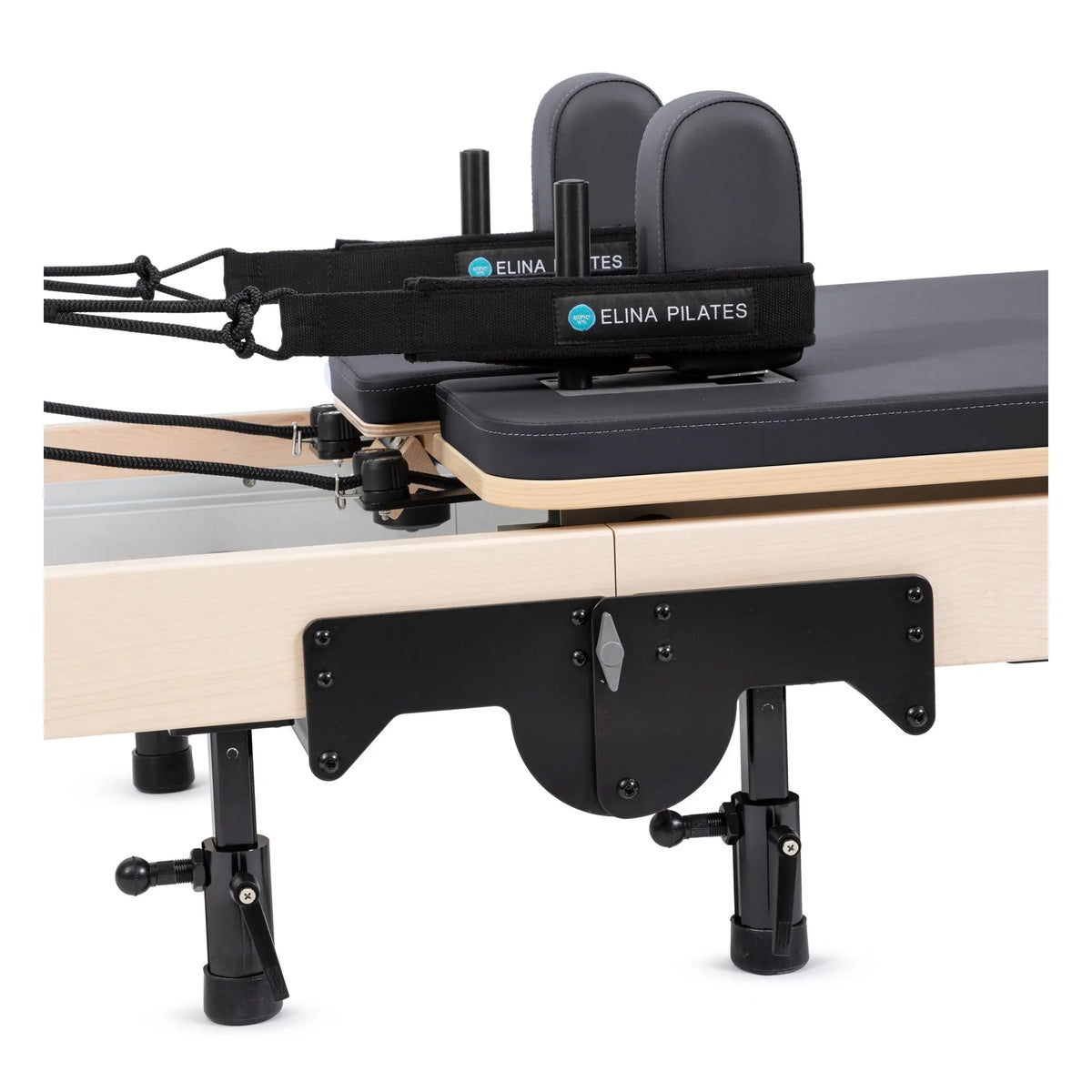 Close-up of the carriage and shoulder rests on the Elina Pilates Fold Reformer