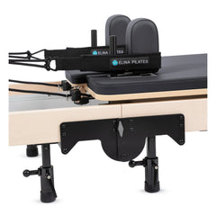 Close-up of the carriage and shoulder rests on the Elina Pilates Fold Reformer