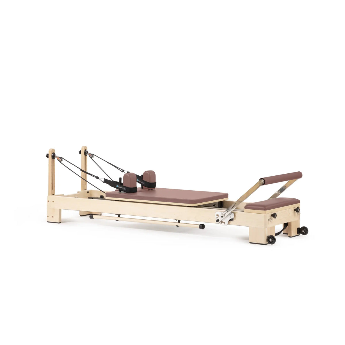 Custom-color Elina Pilates Lignum wooden reformer in Dusty Rose, angled view