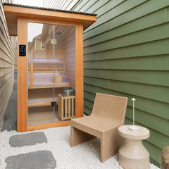 Revive 2 Person Traditional Sauna exterior with roofing kit installed outdoors