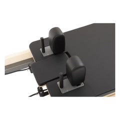 Adjustable shoulder rests on the Elina Pilates Lignum Reformer