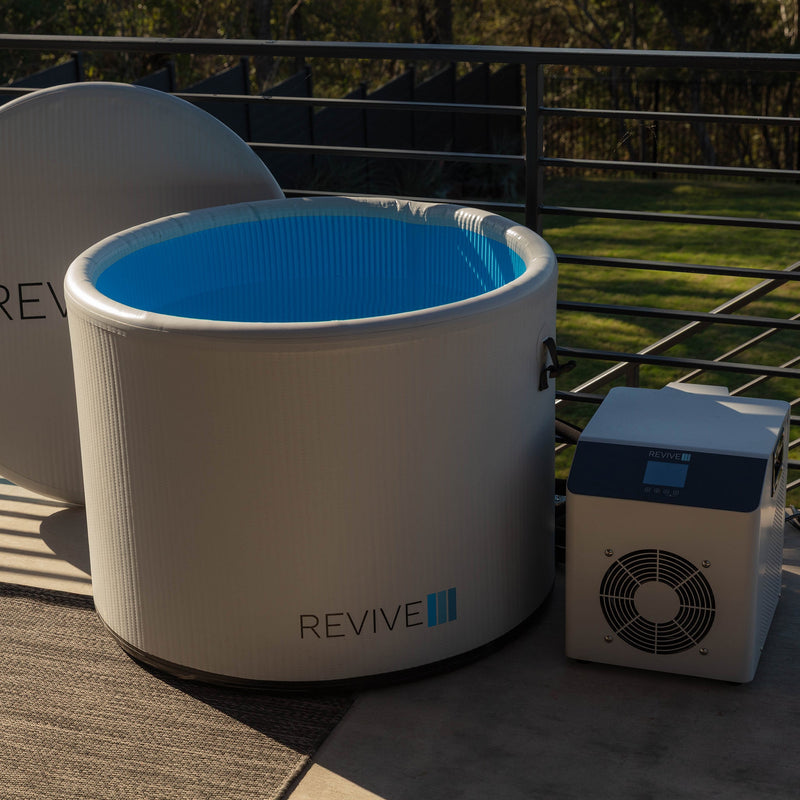 Person preparing the Revive Inflatable Pod Plunge for first use