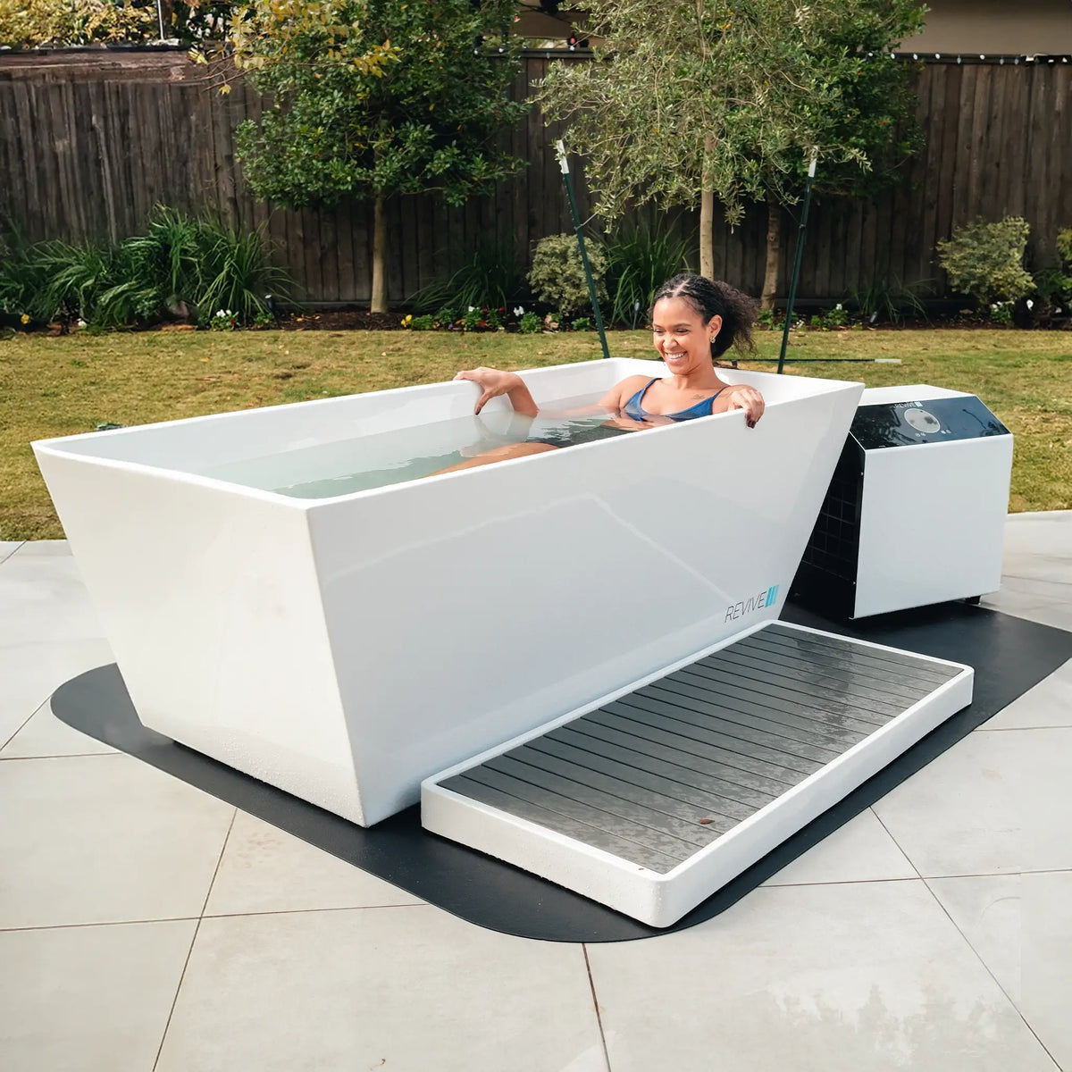 Full Revive Acrylic Plunge setup with chiller in a backyard