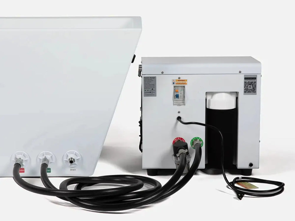Rear connections, hoses and filtration canister on a Revive cold plunge system.