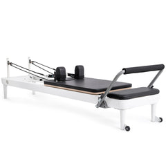 Elina Pilates Nubium aluminum reformer with black upholstery, angled view