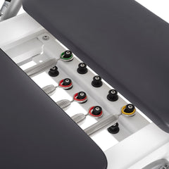 Nubium reformer resistance system with five springs and black upholstery