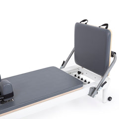Black jump board and adjustable footbar on the Nubium reformer