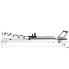 Elina Pilates Nubium aluminum reformer with gray upholstery, side view
