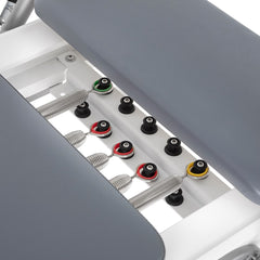 Nubium reformer resistance system with five springs and gray upholstery