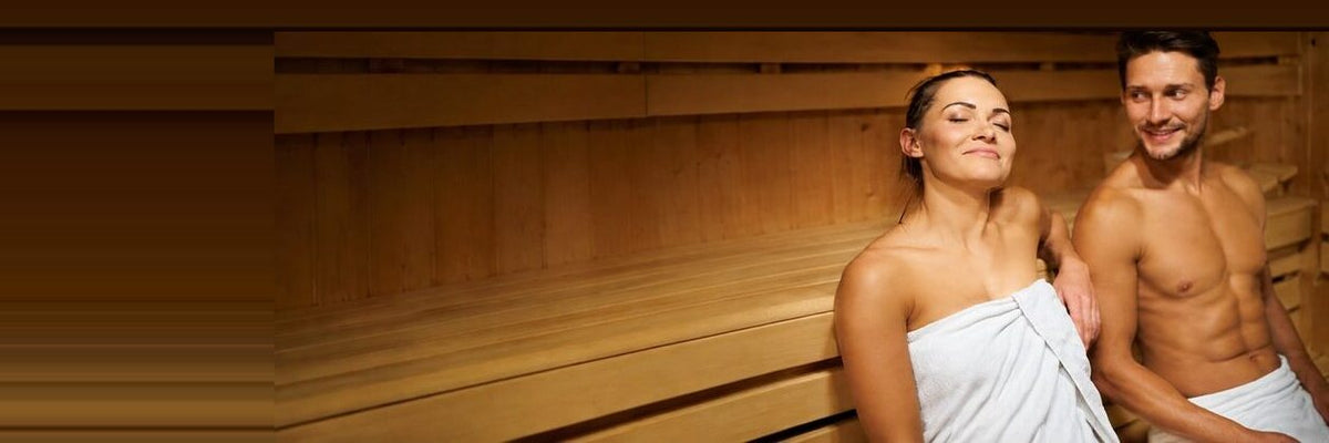 Couple relaxing together inside a home sauna