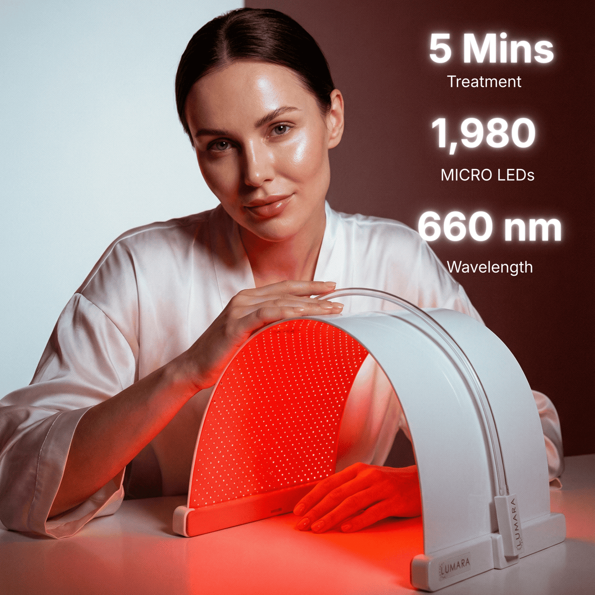 Woman using the Lumara Illuminate Red V2 660 nm red light therapy panel