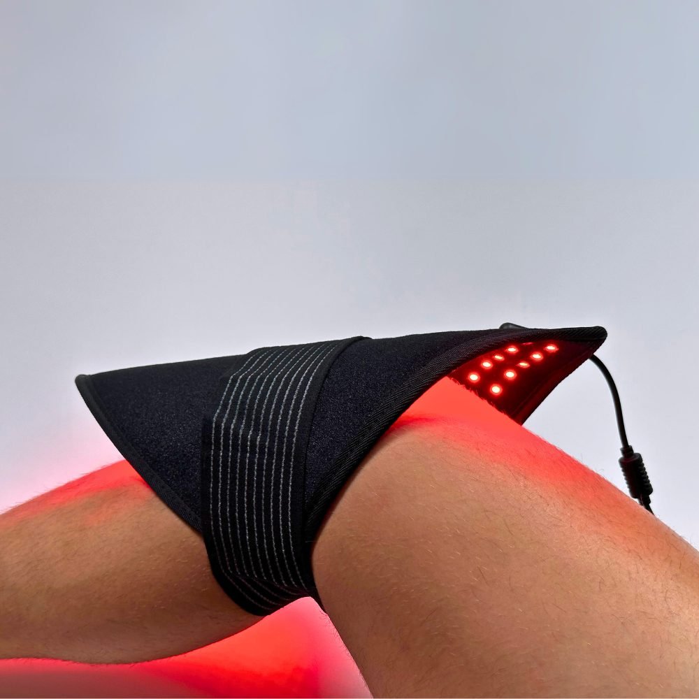 Woman using the flexible Lumara Pad around her knee