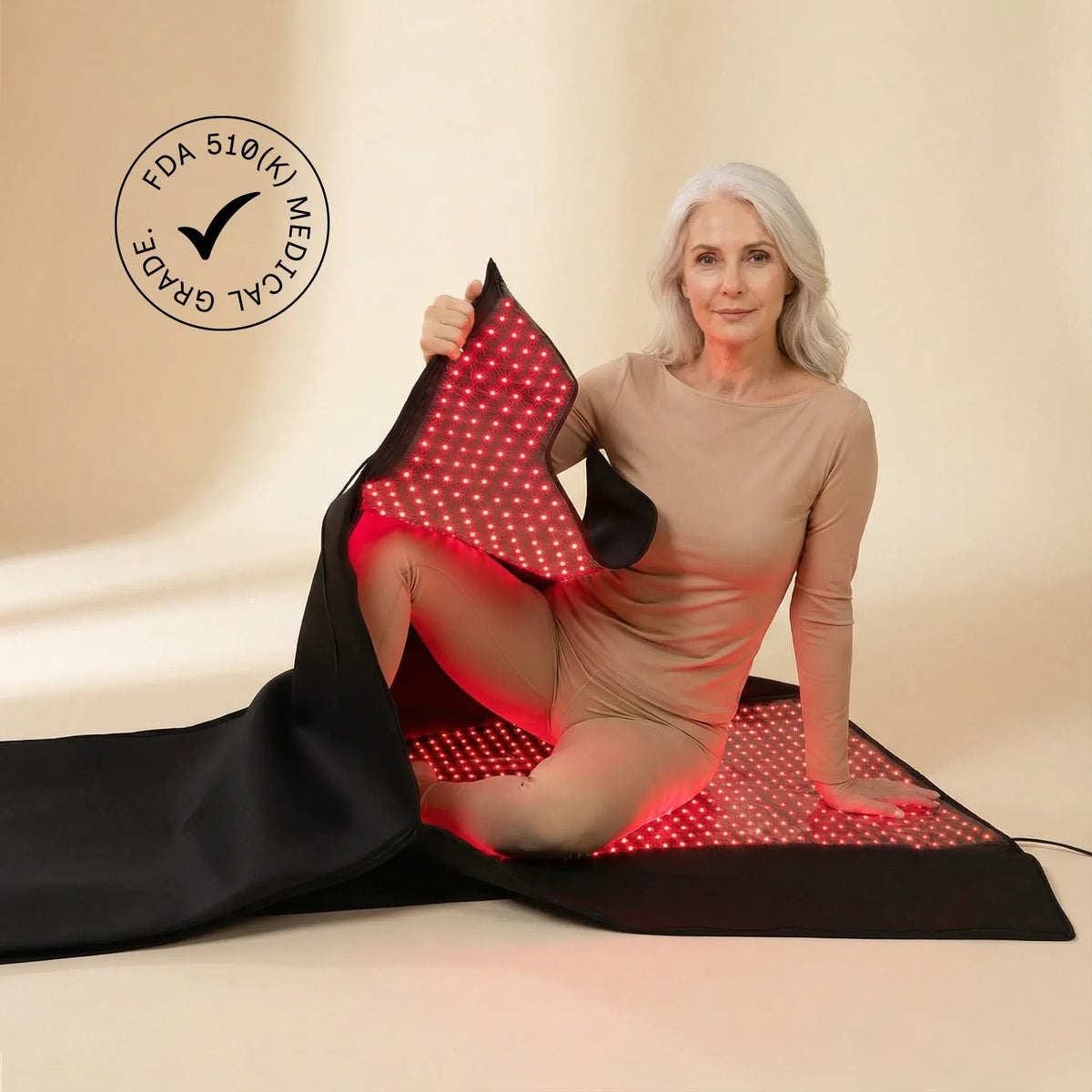 Woman holding the open Nicebeam full body red light therapy bag