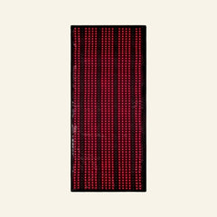 Nicebeam full body red light therapy mat illuminated on a clear background