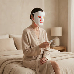 Woman wearing the Nicebeam LED face mask during an at home session