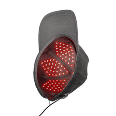 Interior view of the Red Light Pro Devices therapy hat with three illuminated LED panels and controller cable