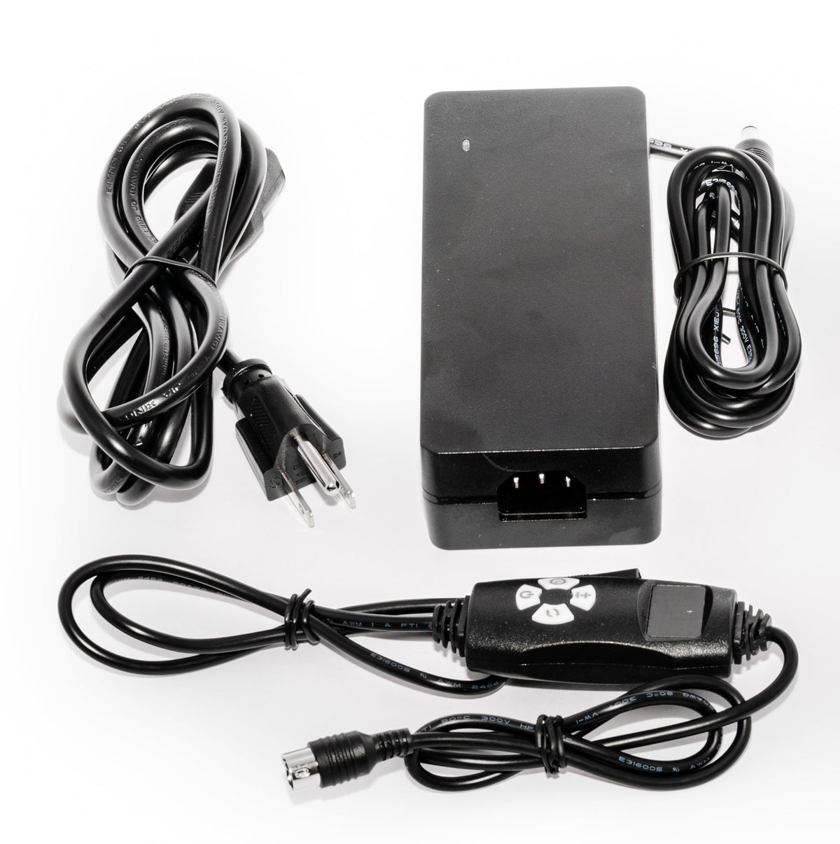 Power supply, cables and inline controllers included with the Red Light Pro Devices therapy hat
