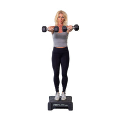 Woman exercising with dumbbells on the VibePlate Mini